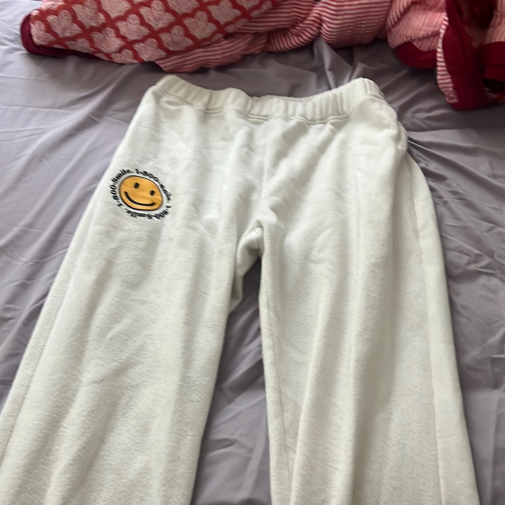 smiley face white sweatpants
